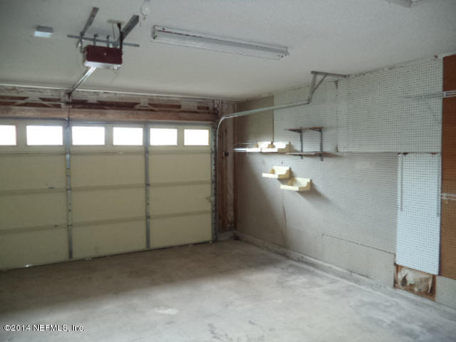 3853 Winter Berry Road Jacksonville, FL 32210 - Photo 10 of 10 NEW Garage Door Spring Missing on LH Si
