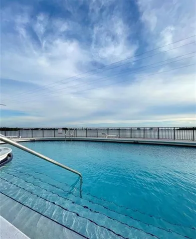 a view of outdoor space with wooden floor and fence