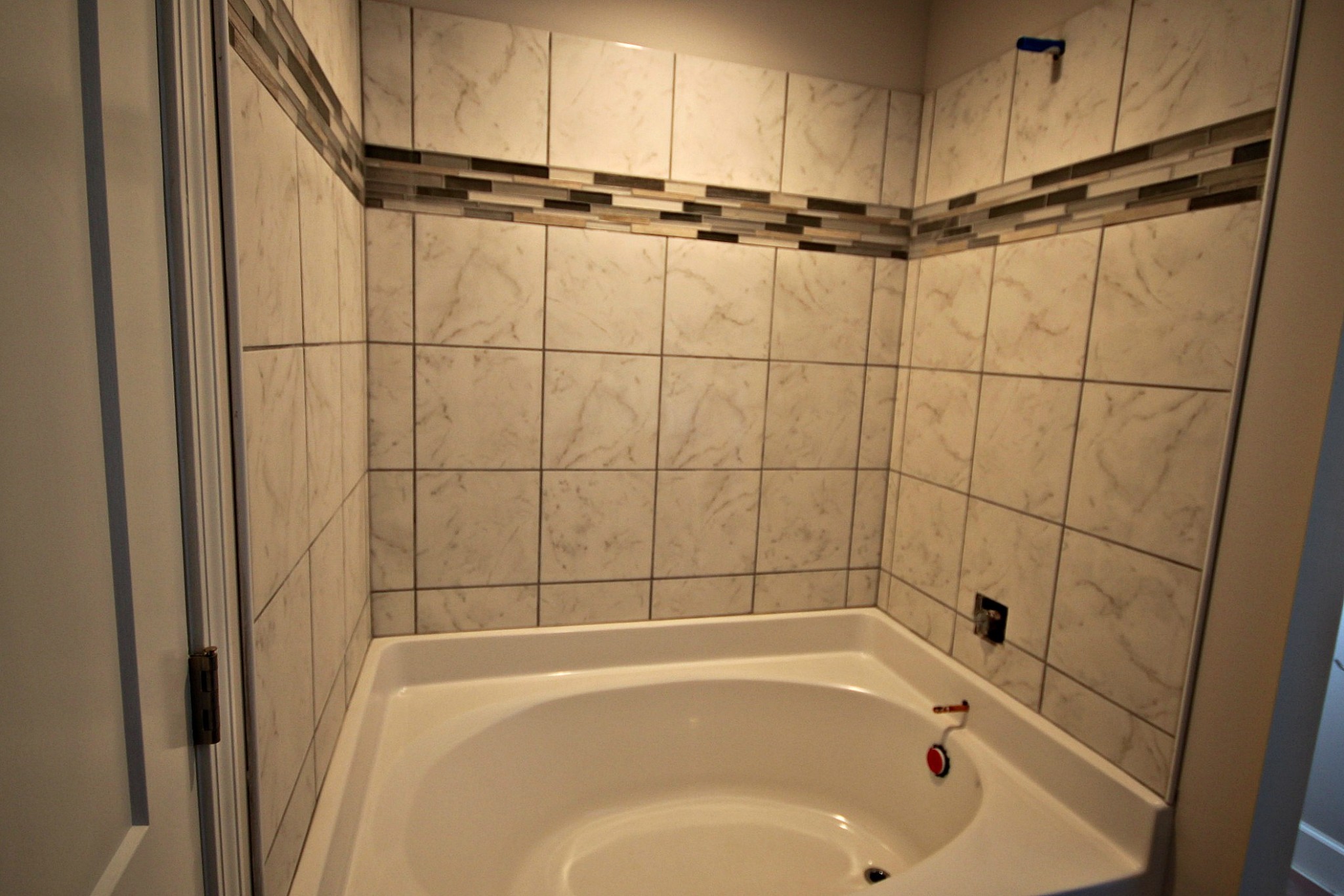 4118 Dot Road Springfield, TN 37172 - Photo 11 of 14 a bathroom with a tub and a shower