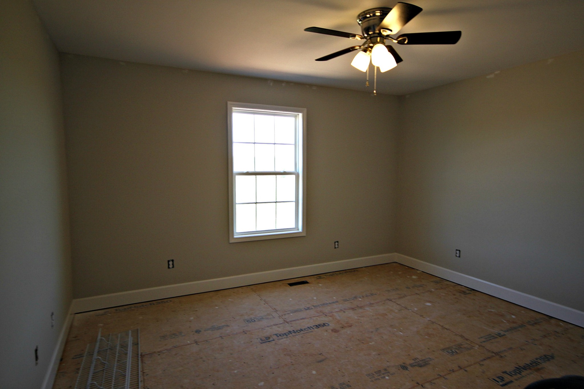 4118 Dot Road Springfield, TN 37172 - Photo 13 of 14 an empty room with a window and a fan