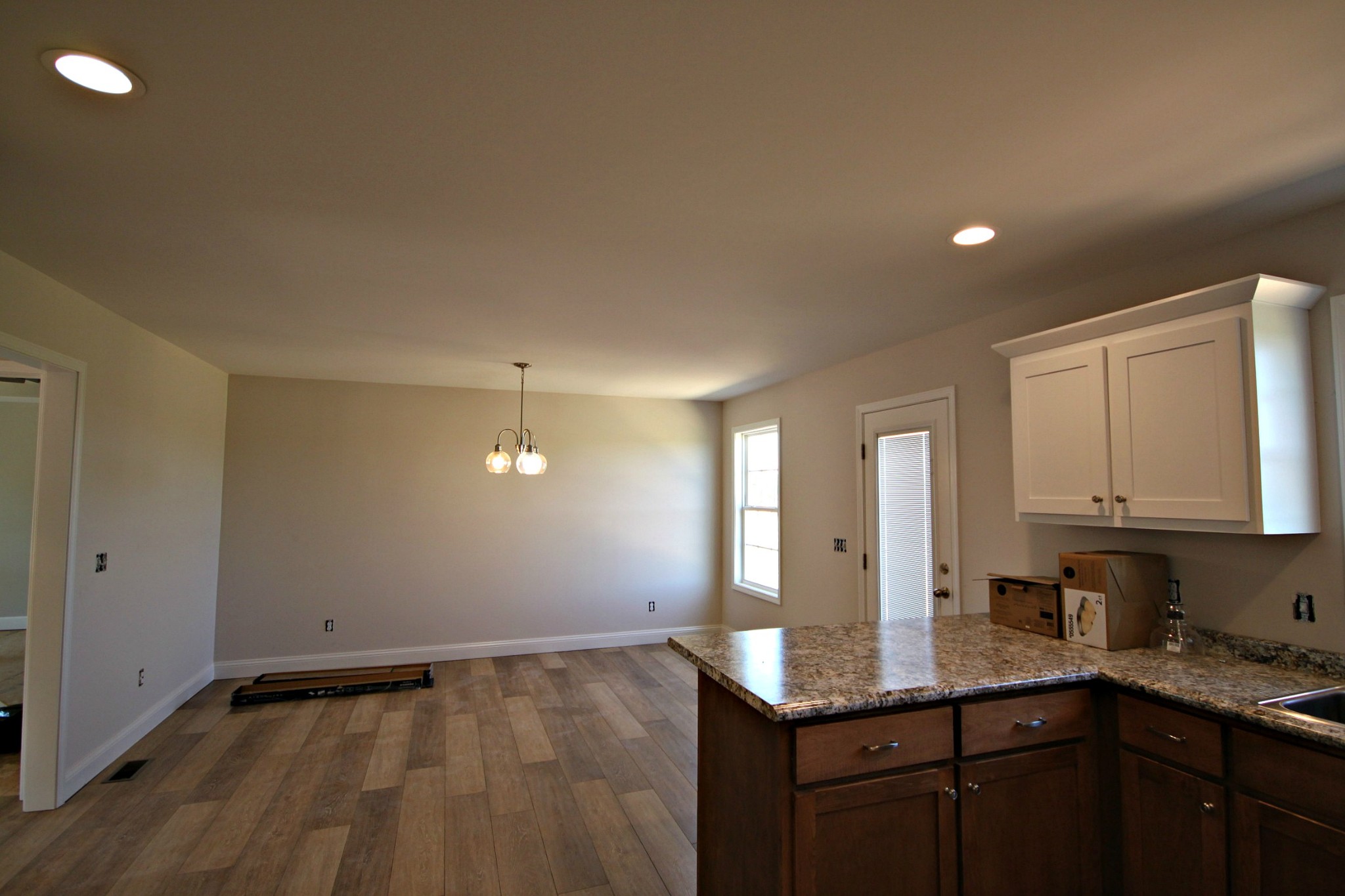 4118 Dot Road Springfield, TN 37172 - Photo 7 of 14 a kitchen with a sink cabinets and wooden floor