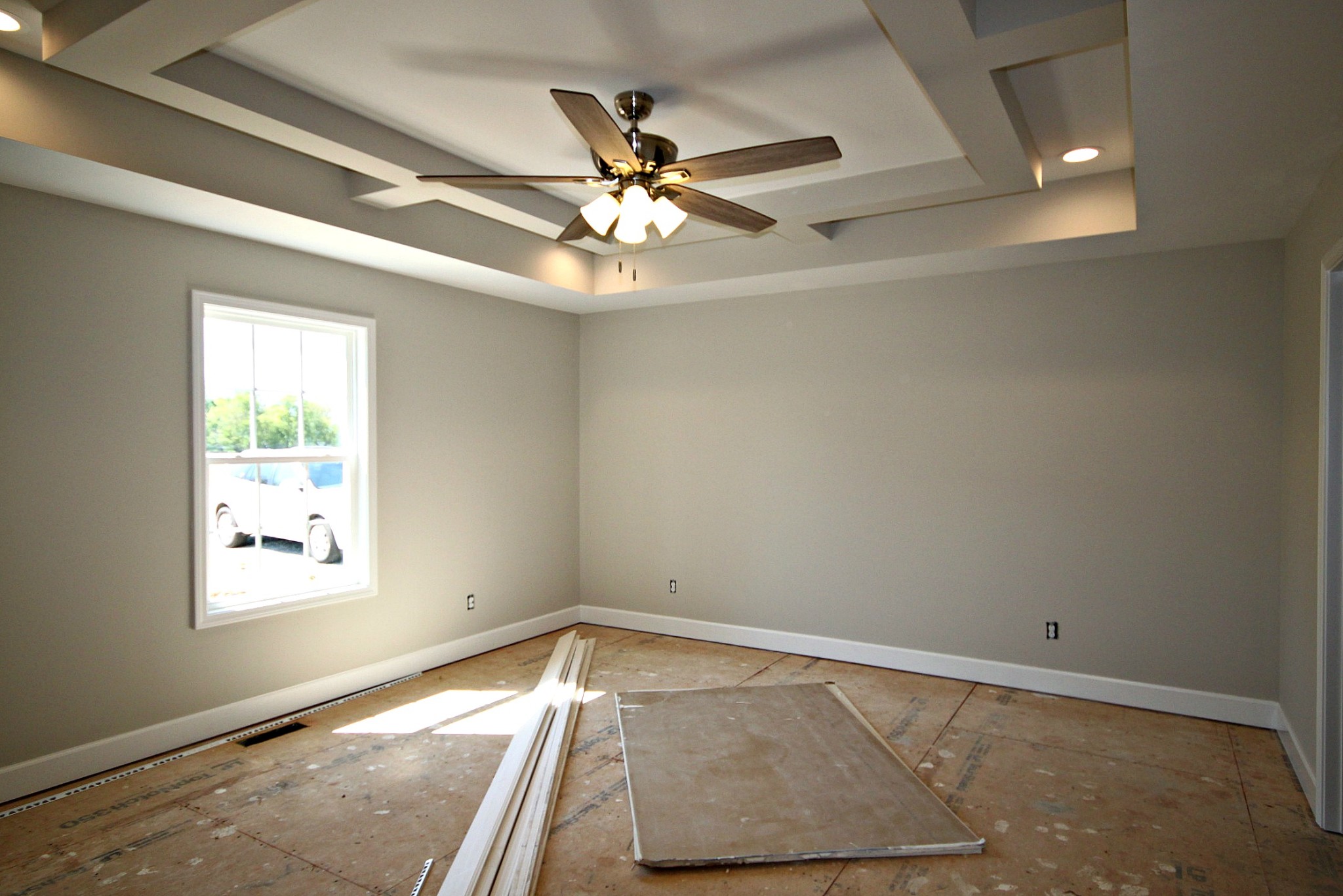 4118 Dot Road Springfield, TN 37172 - Photo 9 of 14 an empty room with wooden floor fan and windows