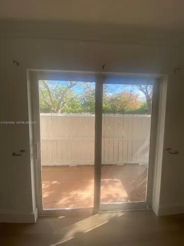 a view of a street with cars on city street