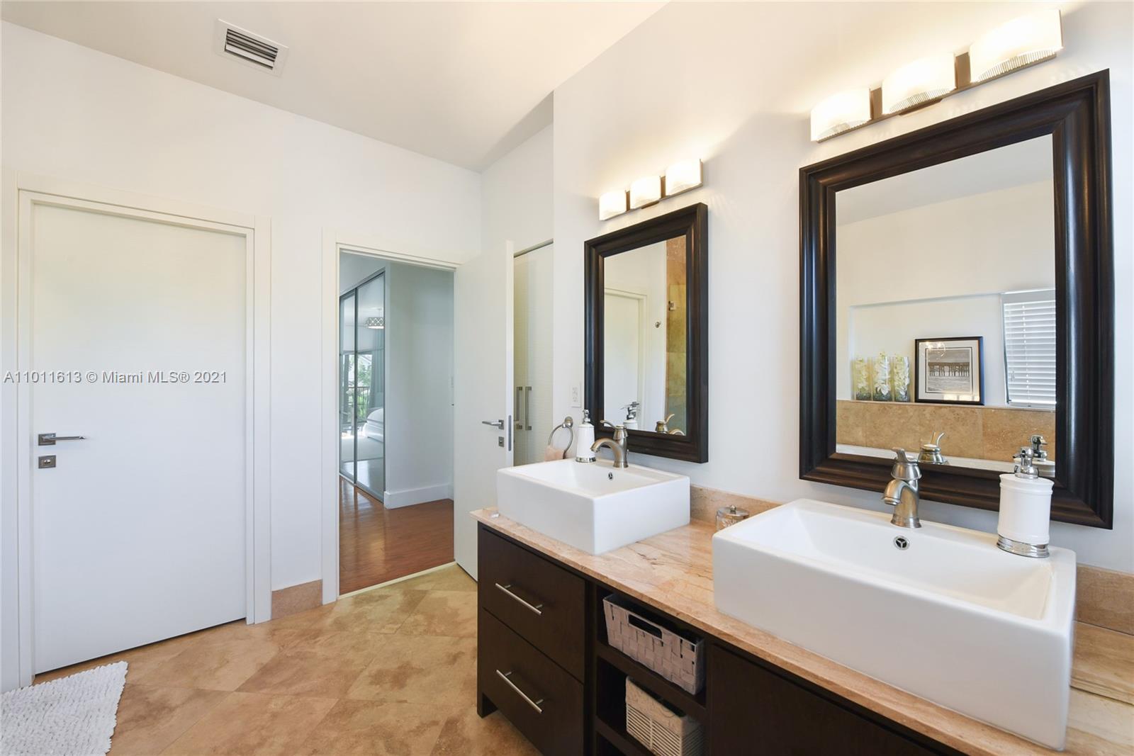 471 Southwest 30th Road Miami, FL 33129 - Photo 22 of 27 Other view | Close-up Master Bathroom Double Sinks
