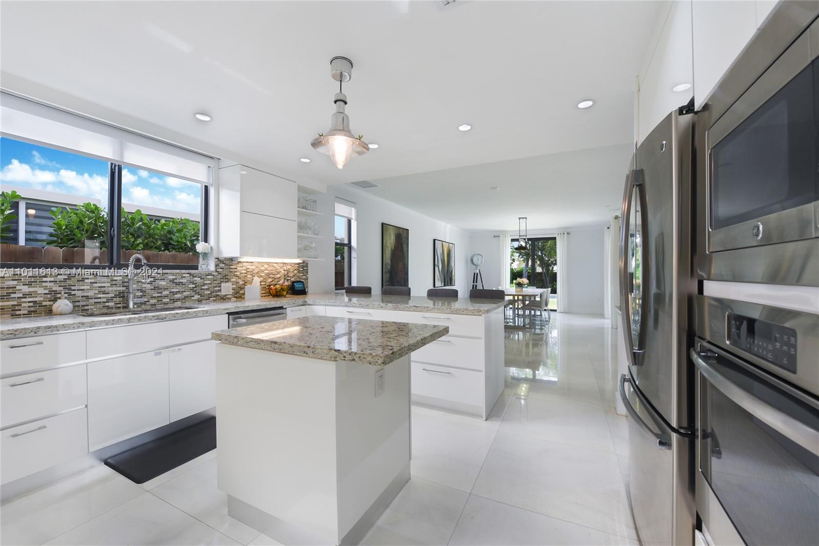 471 Southwest 30th Road Miami, FL 33129 - Photo 3 of 27 Custom KitchenCabinetry | Granite Countertops | Stainless Steel Appliances | Recessed Lighting all throughout