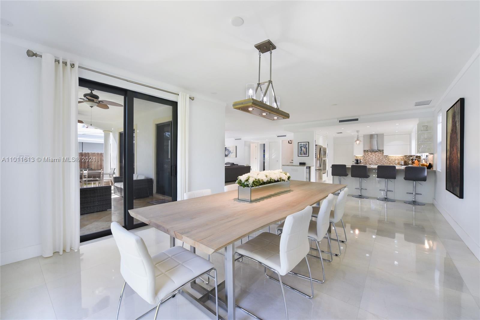 471 Southwest 30th Road Miami, FL 33129 - Photo 5 of 27 Dining Area that opens towards the covered patio porch area