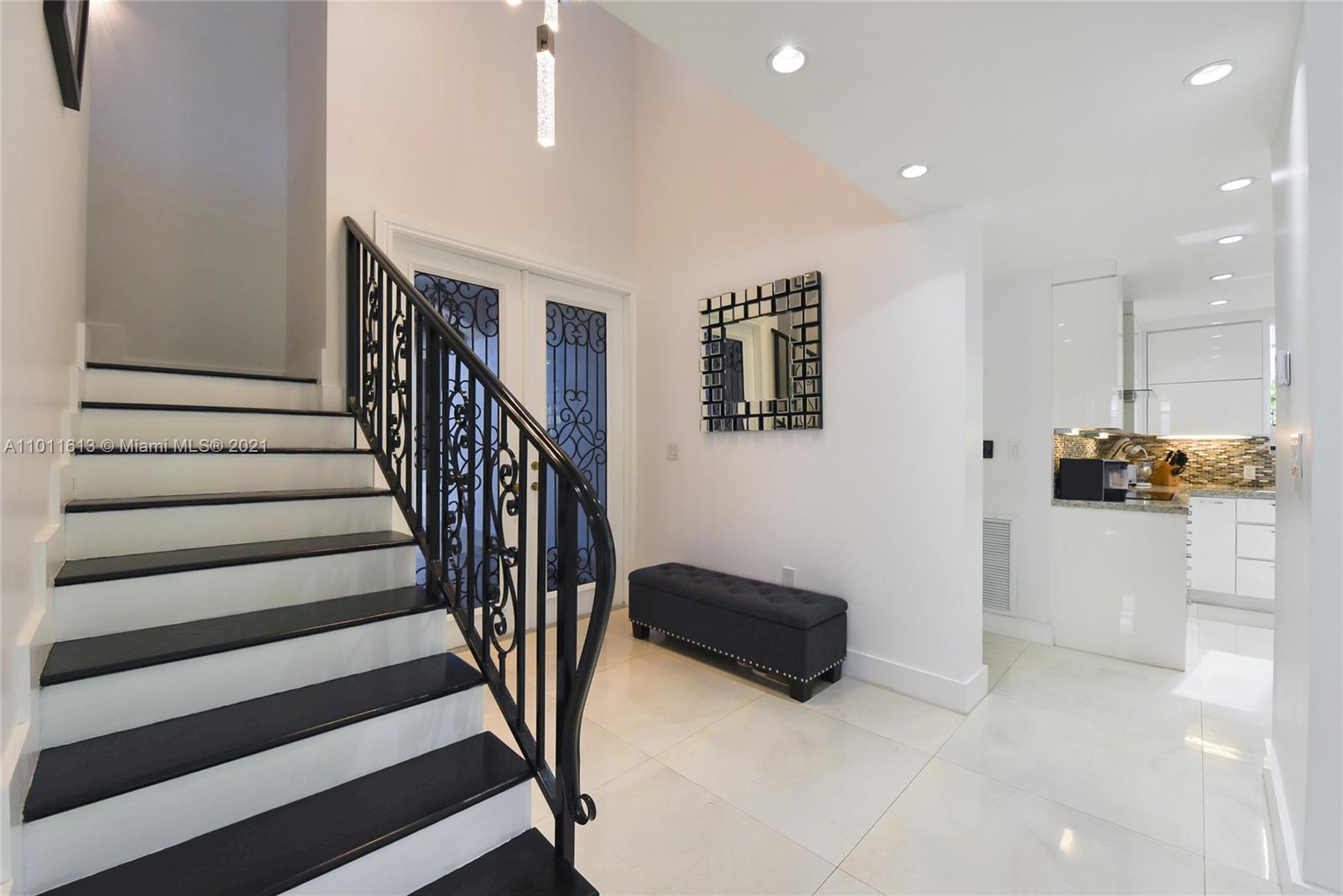 471 Southwest 30th Road Miami, FL 33129 - Photo 8 of 27 Other view entrance foyer opens toward the Living Room area and Kitchen | View of the staircase