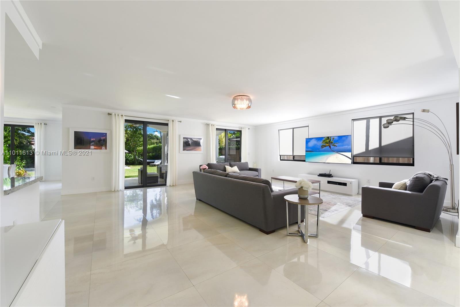471 Southwest 30th Road Miami, FL 33129 - Photo 10 of 27 Spacious Living Room Area | Opens to Dining Room, Kitchen, outside Pool & Covered Porch Area