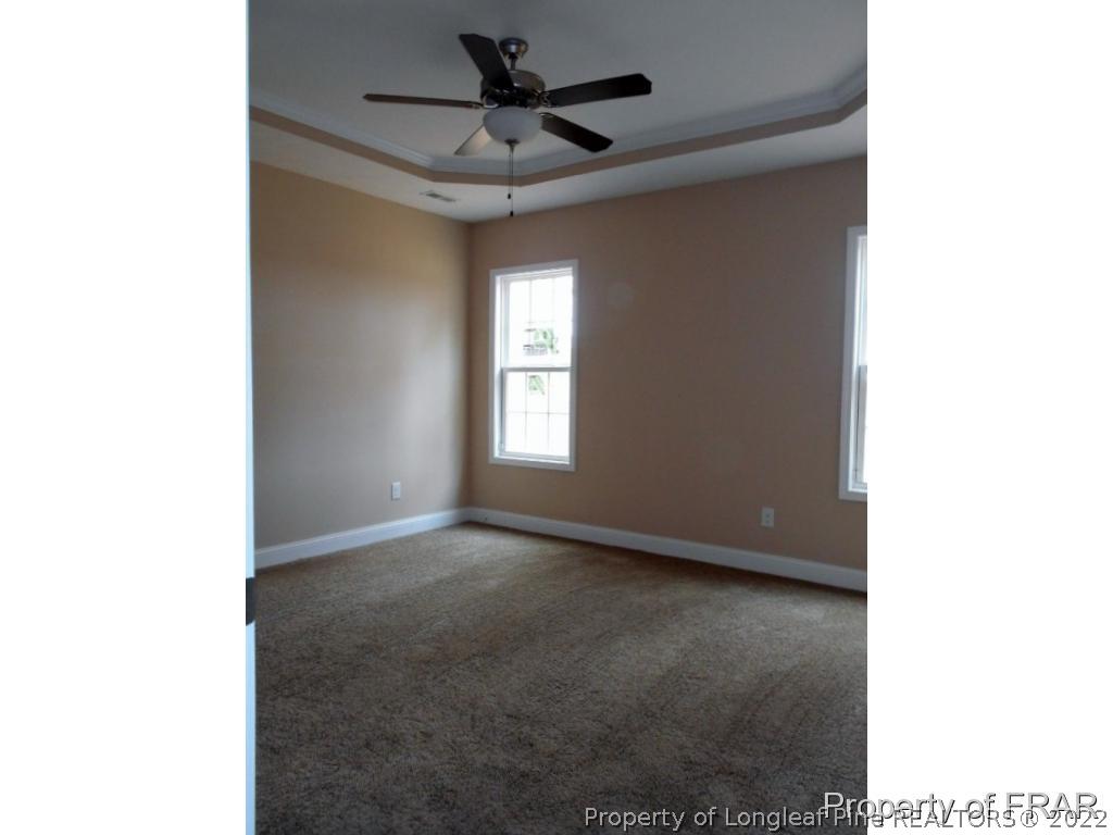 3463 Thrower Road Hope Mills, NC 28348 - Photo 11 of 24 a view of an empty room with a window
