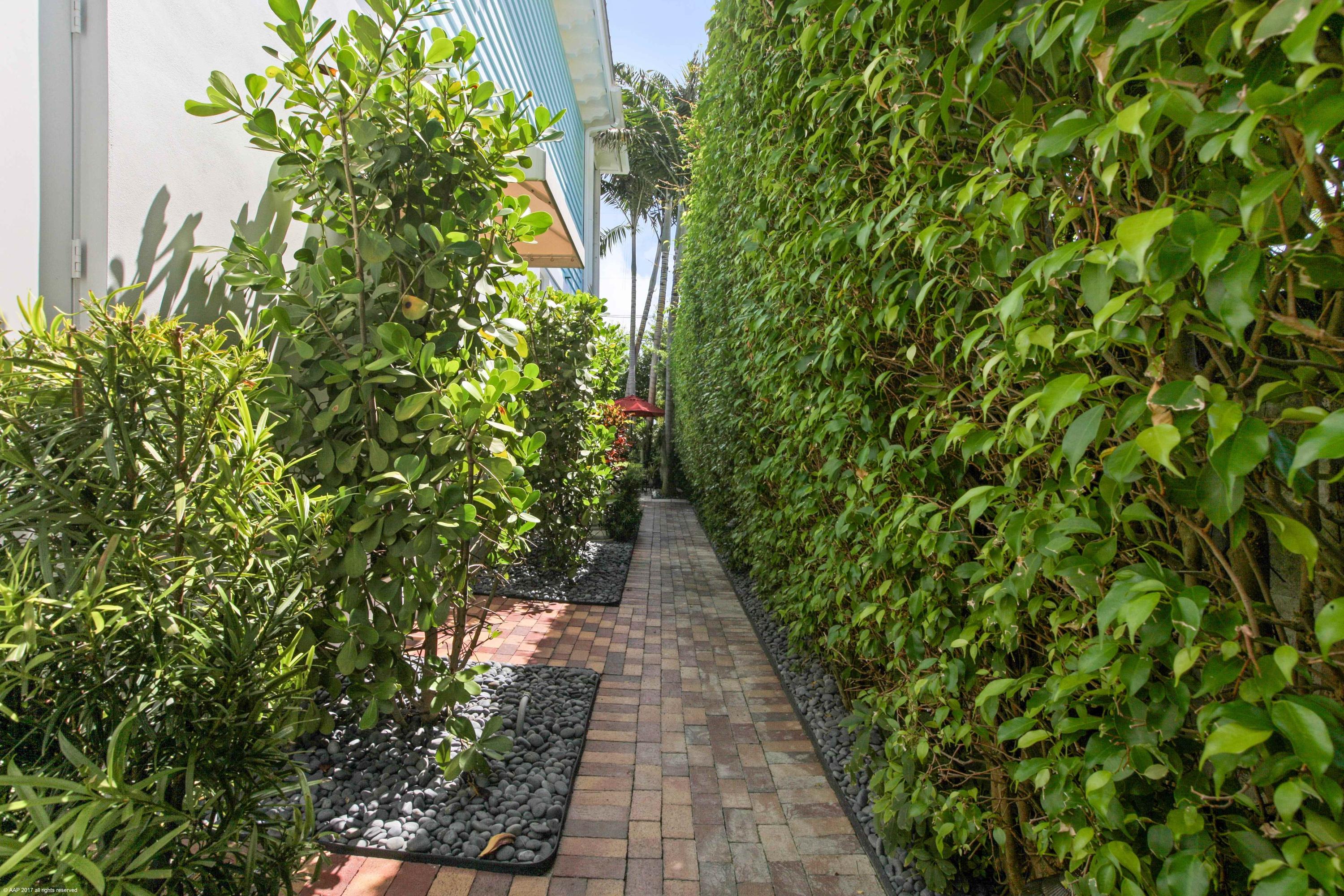 510 Northeast Wavecrest Way Boca Raton, FL 33432 - Photo 39 of 40 SIDE WALKWAY