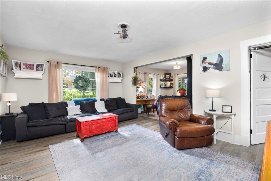 7885 Quarry Road Amherst, OH 44001 - Photo 12 of 28 Living room featuring light hardwood / wood-style floors