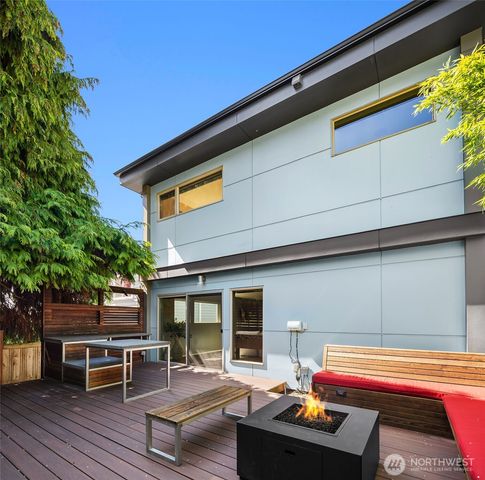 a backyard of a house with seating space