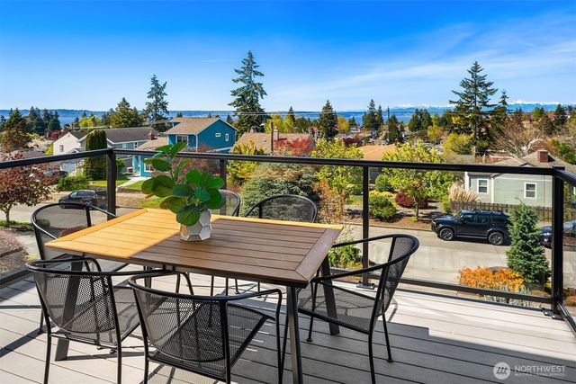 a view of a chairs and table on the terrace