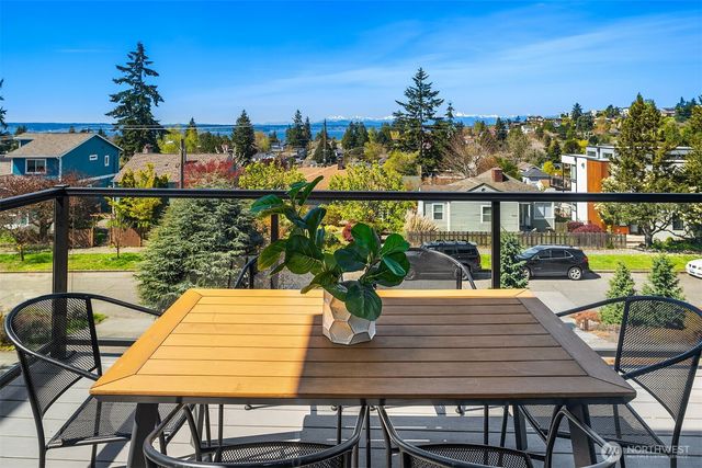 a view of a balcony and chairs