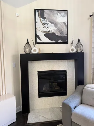 a kitchen with granite countertop a sink a counter space appliances and cabinets