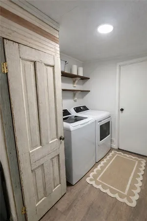 a view of a room with washer and dryer