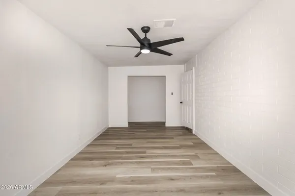 a view of an empty room and window