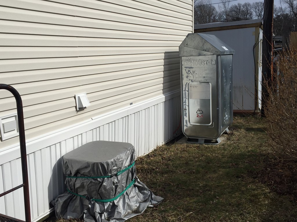 557-122 Southwest Cutoff Worcester, MA 01607 - Photo 11 of 12 a view of backyard with barbeque grill and seating space