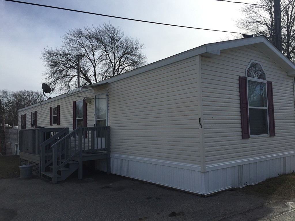 557-122 Southwest Cutoff Worcester, MA 01607 - Photo 2 of 12 a view of a house with a yard