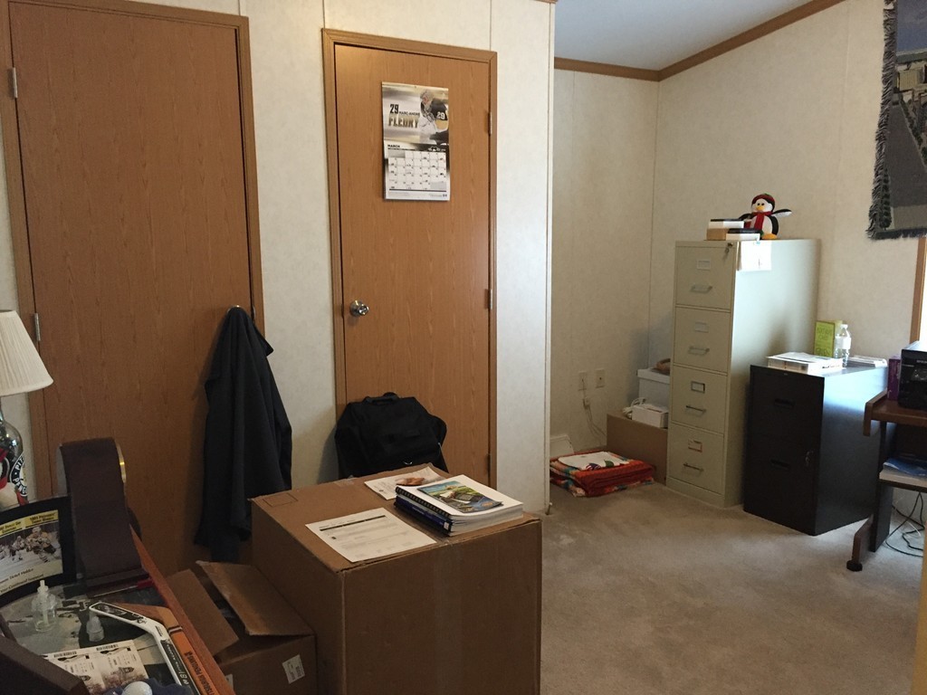 557-122 Southwest Cutoff Worcester, MA 01607 - Photo 6 of 12 a room with storage and utility