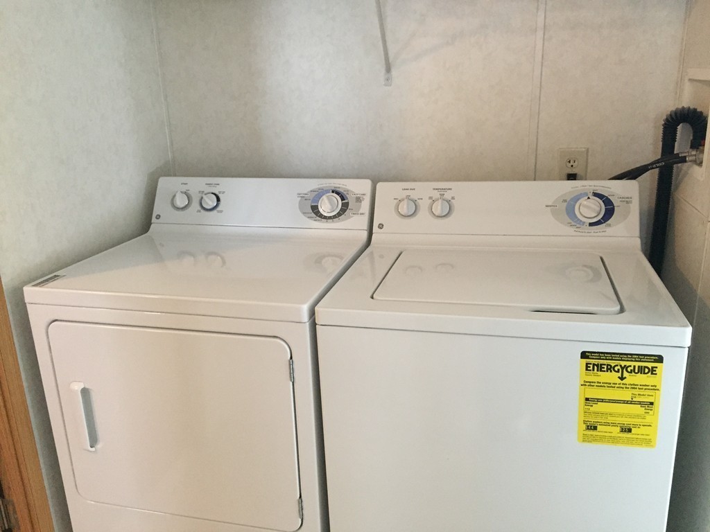 557-122 Southwest Cutoff Worcester, MA 01607 - Photo 7 of 12 a utility room with dryer and washer