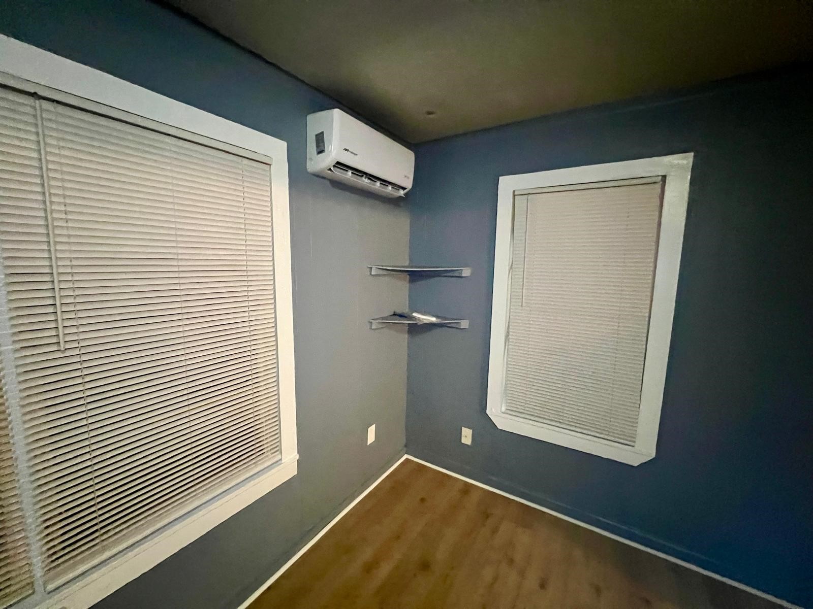 13928 Bandera Street Houston, TX 77015 - Photo 15 of 40 a view of a room with rack on the wall and a window