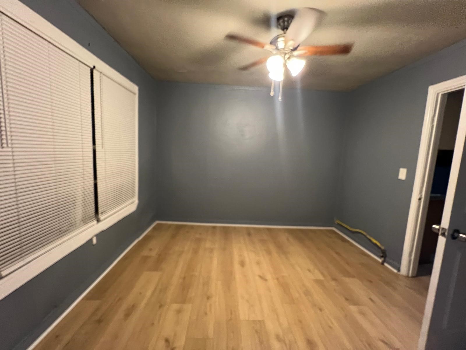 13928 Bandera Street Houston, TX 77015 - Photo 20 of 40 wooden floor in an empty room with a window