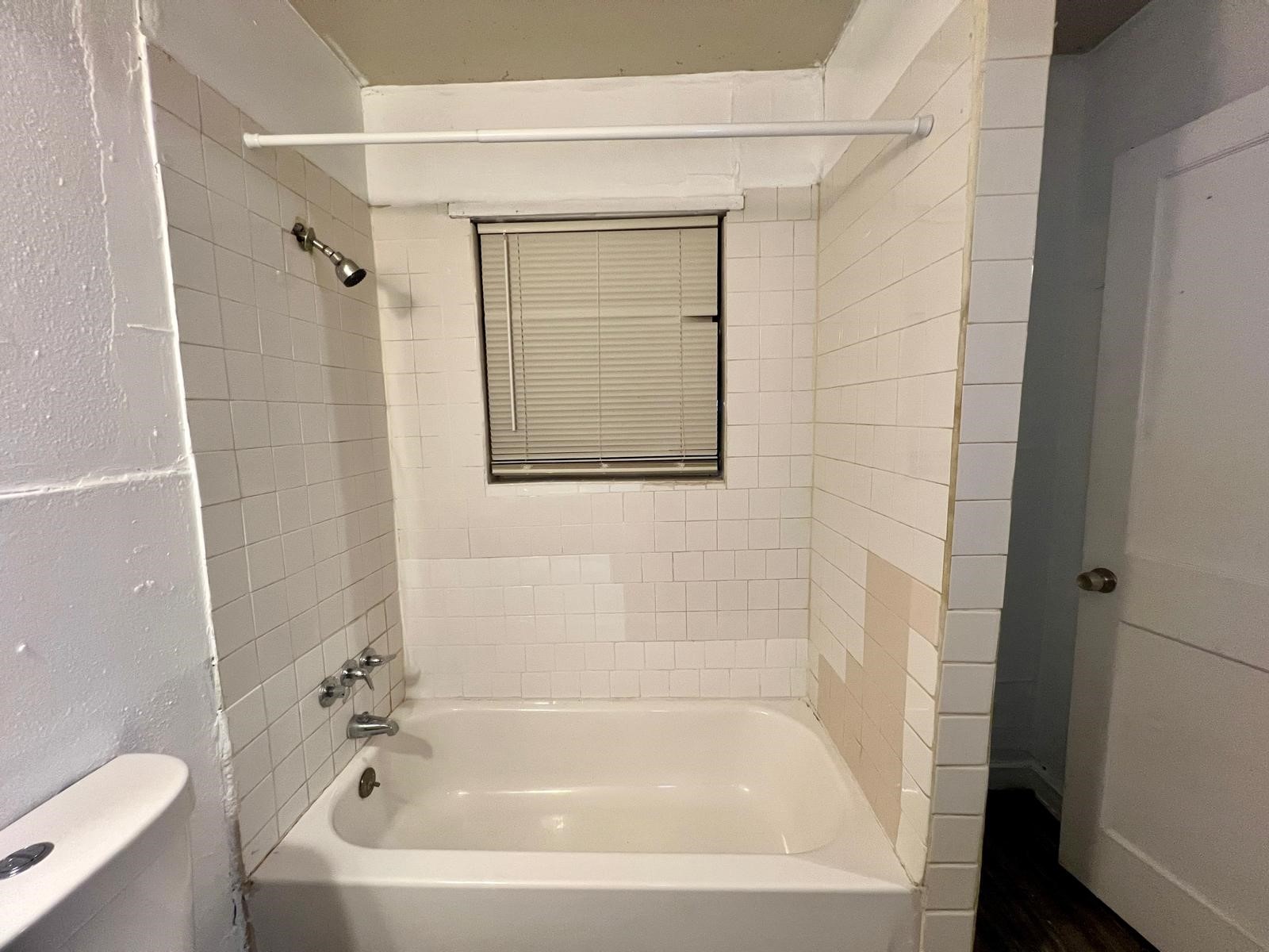 13928 Bandera Street Houston, TX 77015 - Photo 22 of 40 a white bath tub sitting next to a white toilet