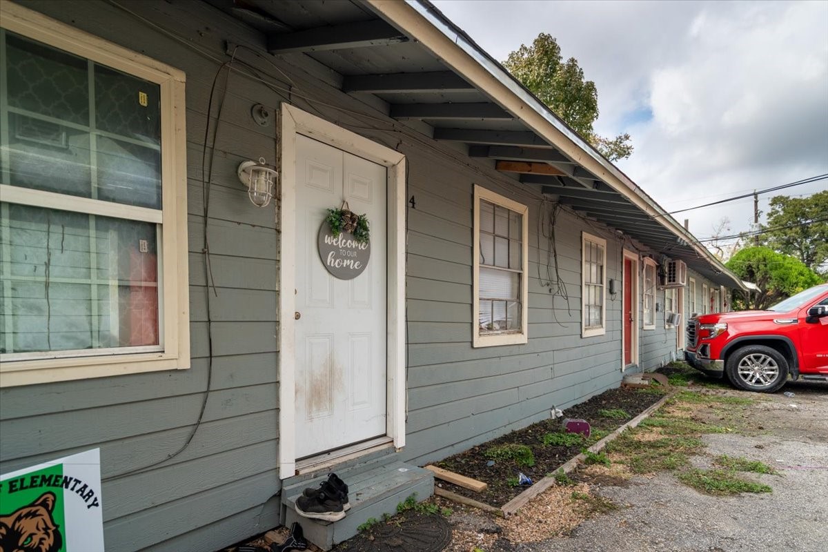 13928 Bandera Street Houston, TX 77015 - Photo 25 of 40 a front view of a house with a garden