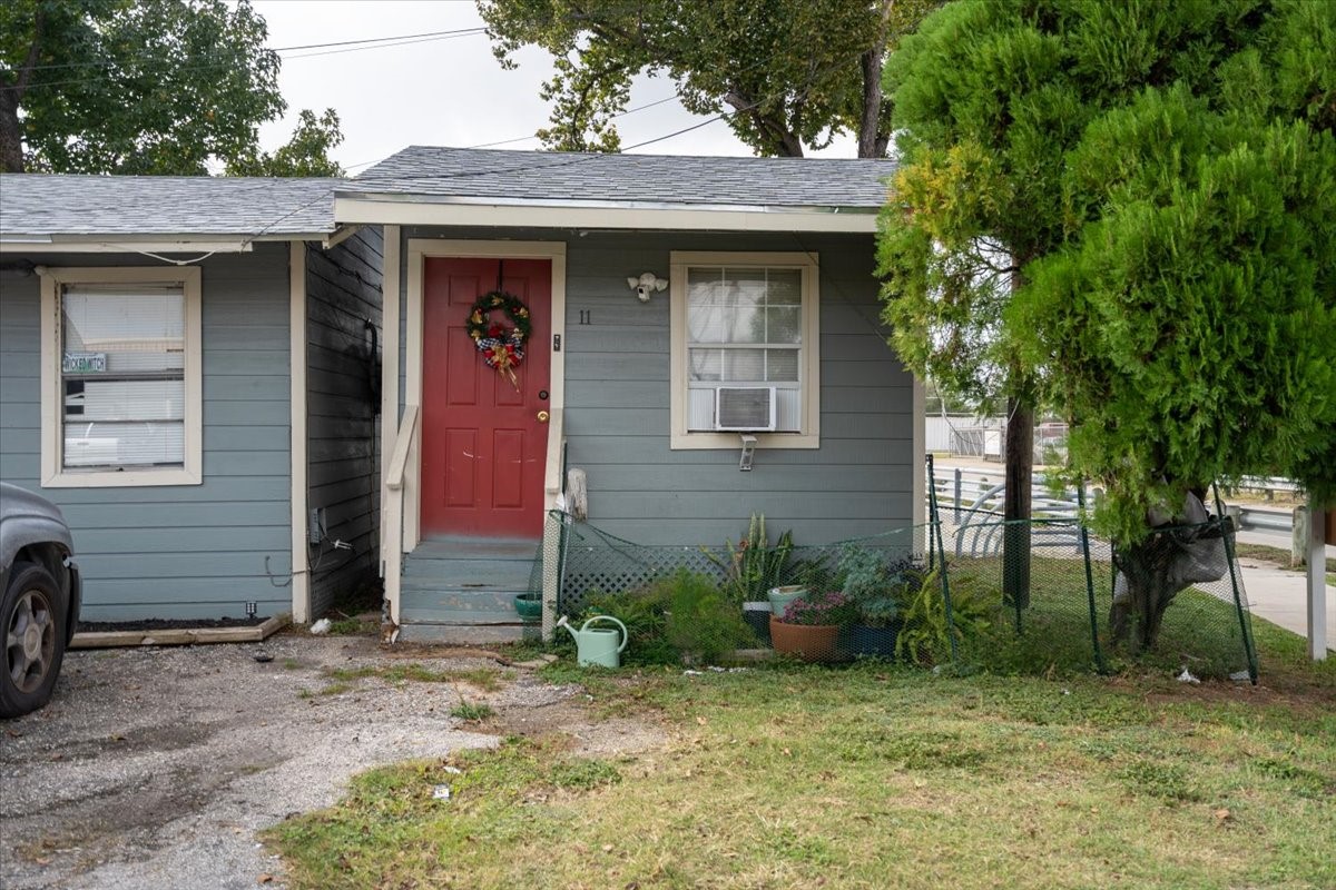 13928 Bandera Street Houston, TX 77015 - Photo 30 of 40 a front view of a house with garden