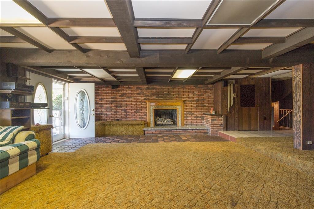 3150 Brodhead Road Aliquippa, PA 15001 - Photo 15 of 19 Brick fireplace with gas logs.....