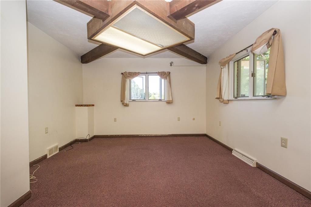 3150 Brodhead Road Aliquippa, PA 15001 - Photo 6 of 19 Den that is located on the main floor with a main entrance door from the outside.