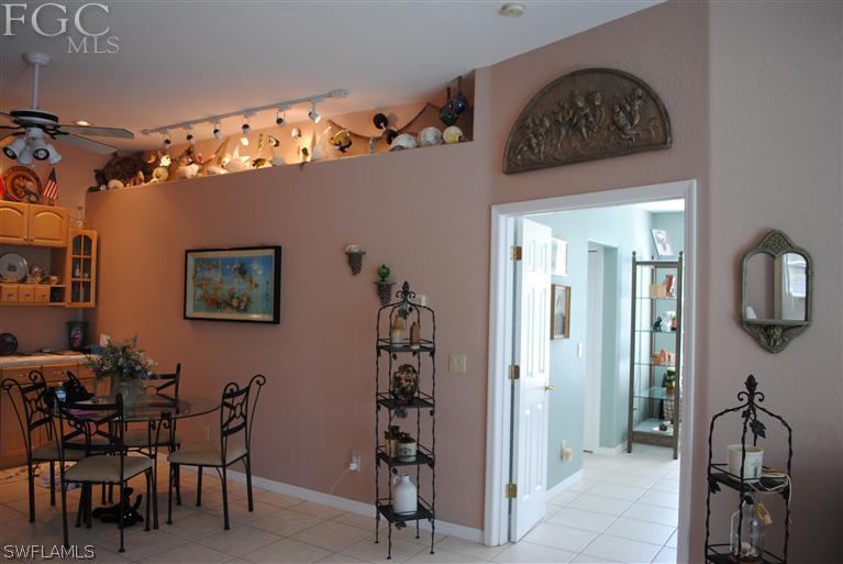 3325 Stringfellow Road, Unit A St. James City, FL 33956 - Photo 5 of 21 a view of a dining room with furniture