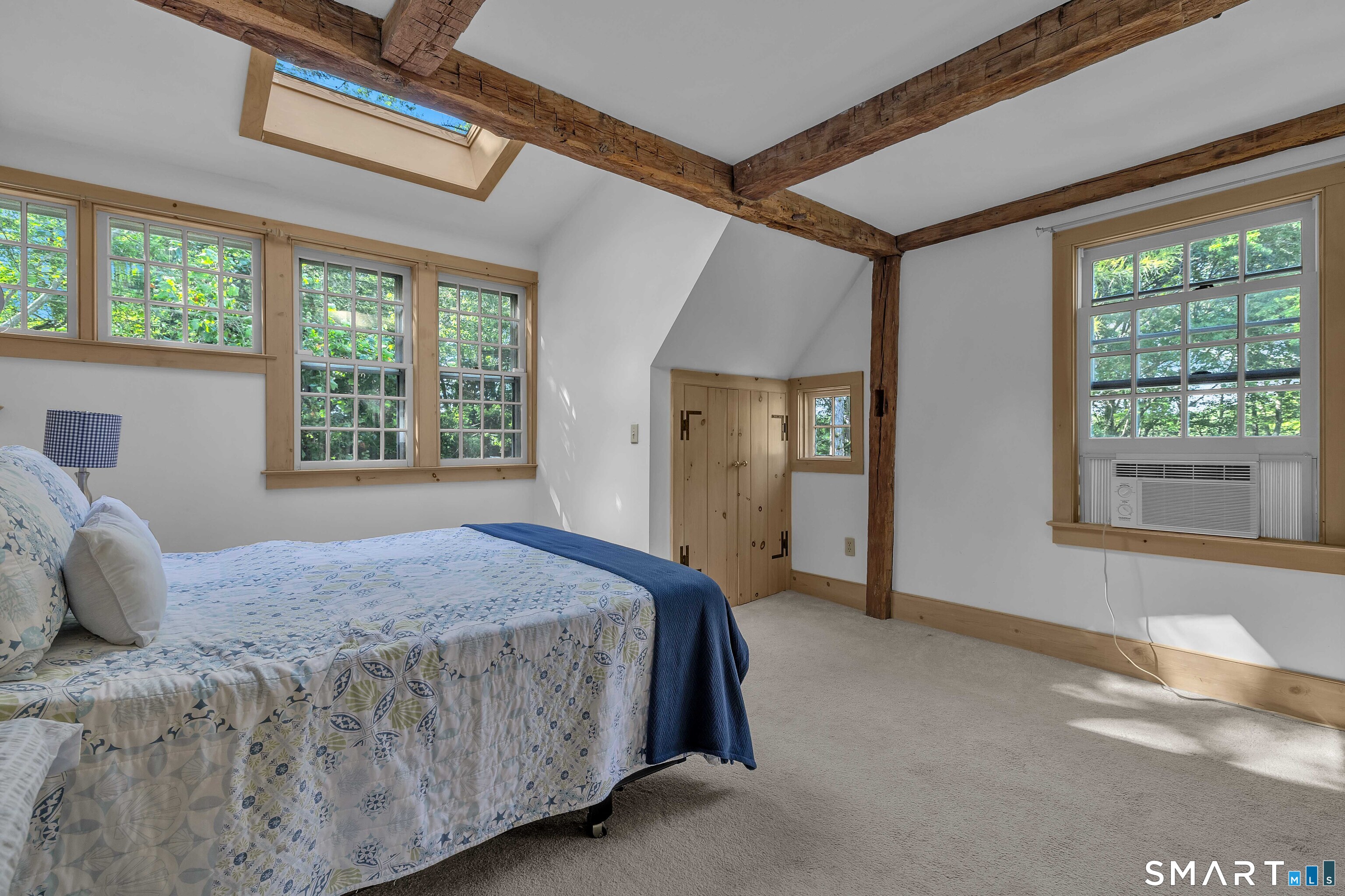 448 Grove Beach Road North Westbrook, CT 06498 - Photo 29 of 38 a bedroom with a large bed and a large window