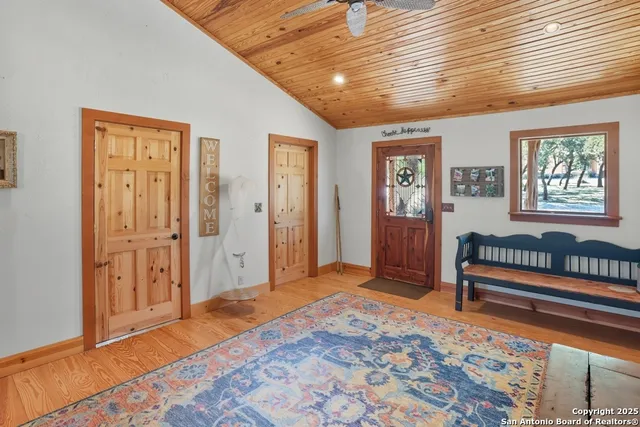 a bedroom with furniture and window