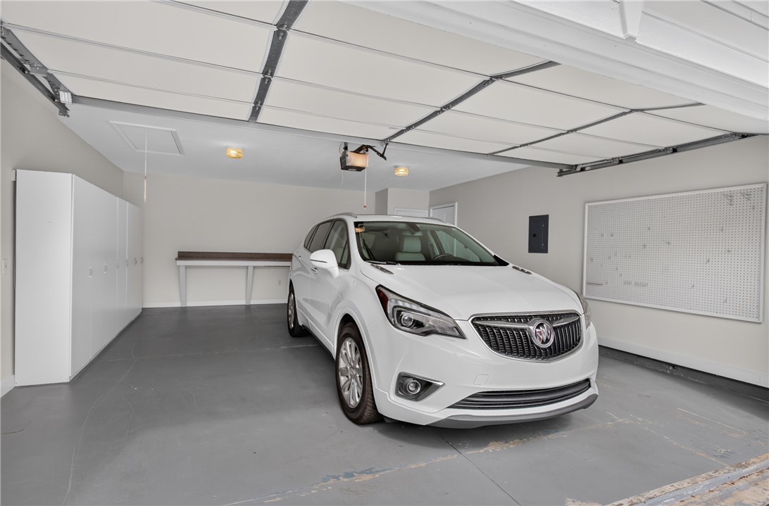 134 Life Style Lane Anderson, SC 29621 - Photo 28 of 44 A pristine garage, offering ample space and built-in storage solutions for organized living.