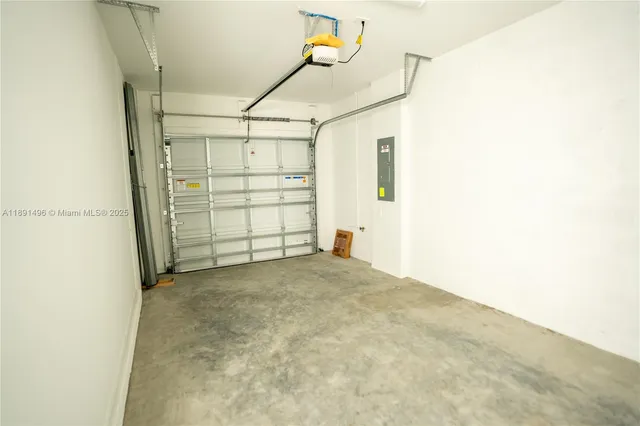 a kitchen with stainless steel appliances a sink a stove and a window