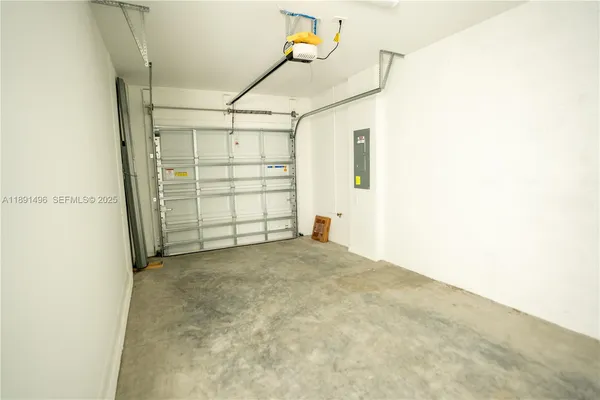 a kitchen with stainless steel appliances a sink a stove and a window