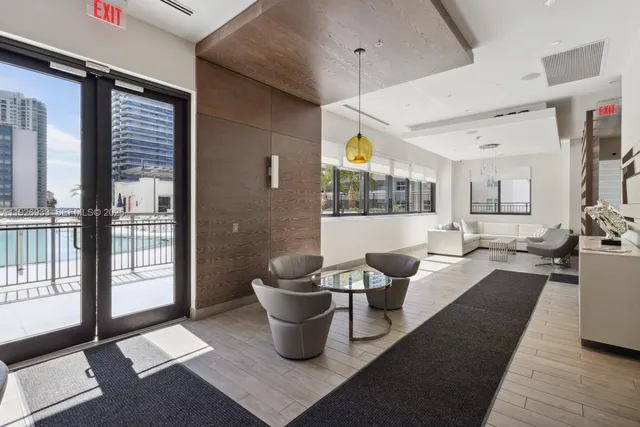a view of a swimming pool with an outdoor seating