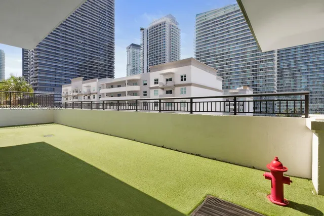 a view of livingroom with furniture and garden