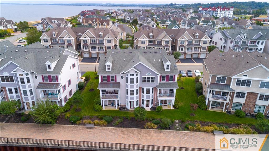 34 Raritan Reach Road, Unit 17 South Amboy, NJ 08879 - Photo 3 of 25 a view of a city with tall buildings