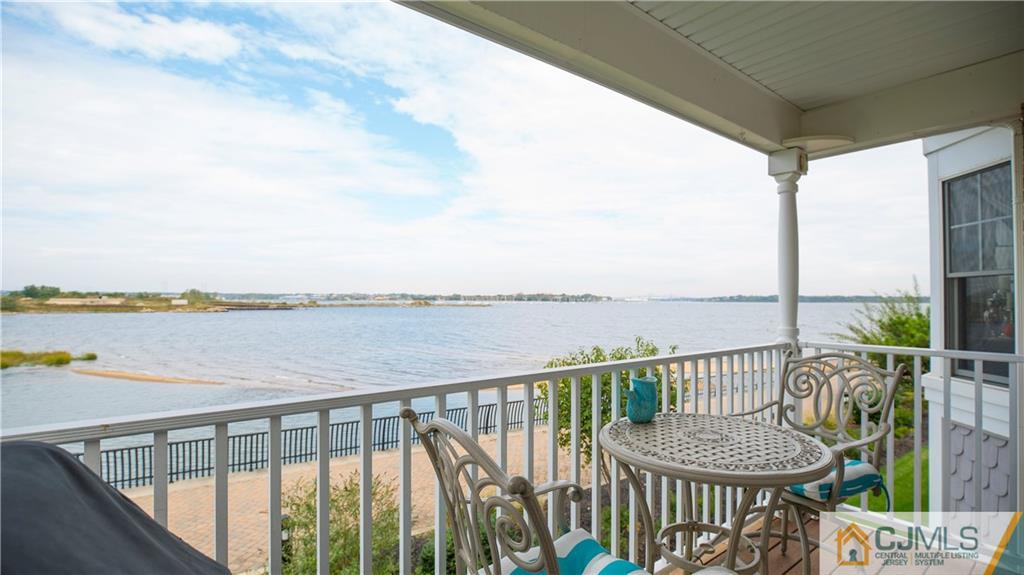 34 Raritan Reach Road, Unit 17 South Amboy, NJ 08879 - Photo 5 of 25 a view of a balcony with lake view and city view