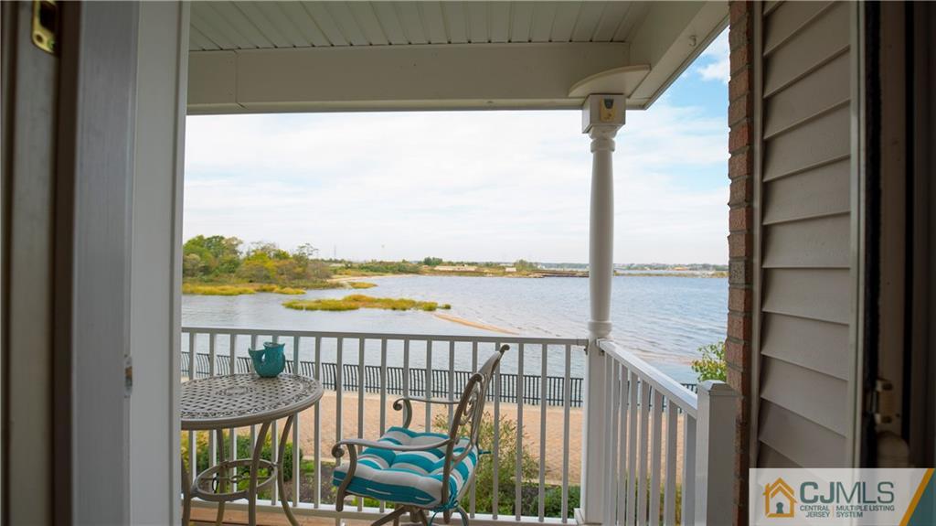 34 Raritan Reach Road, Unit 17 South Amboy, NJ 08879 - Photo 6 of 25 a view of a balcony with lake view