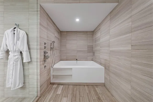 a bathroom with a sink and a shower