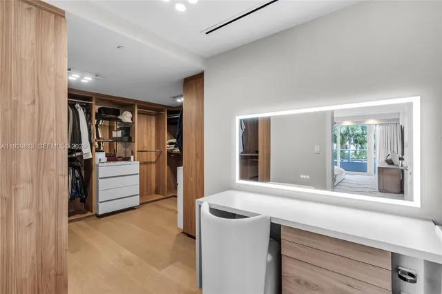 a living room with kitchen island furniture and a kitchen view
