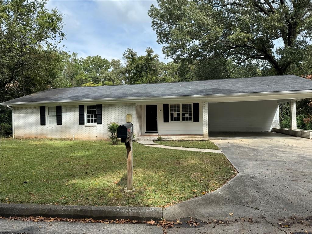 16 Lindberg Drive Northeast Rome, GA 30161 - Photo 1 of 1 a front view of a house with garden