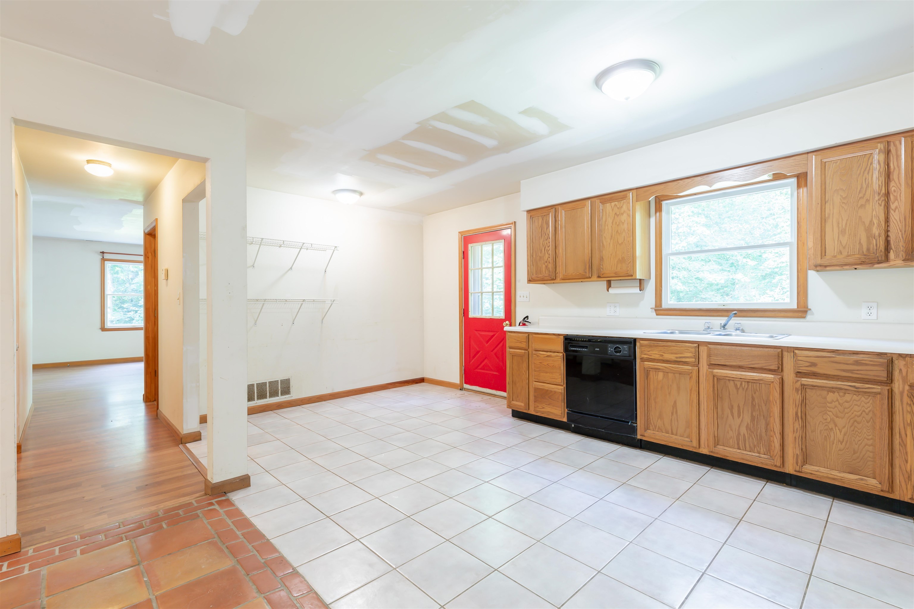 837 Weeks Landing Road Cape May, NJ 08204 - Photo 13 of 38 a view of an empty room with window and kitchen view