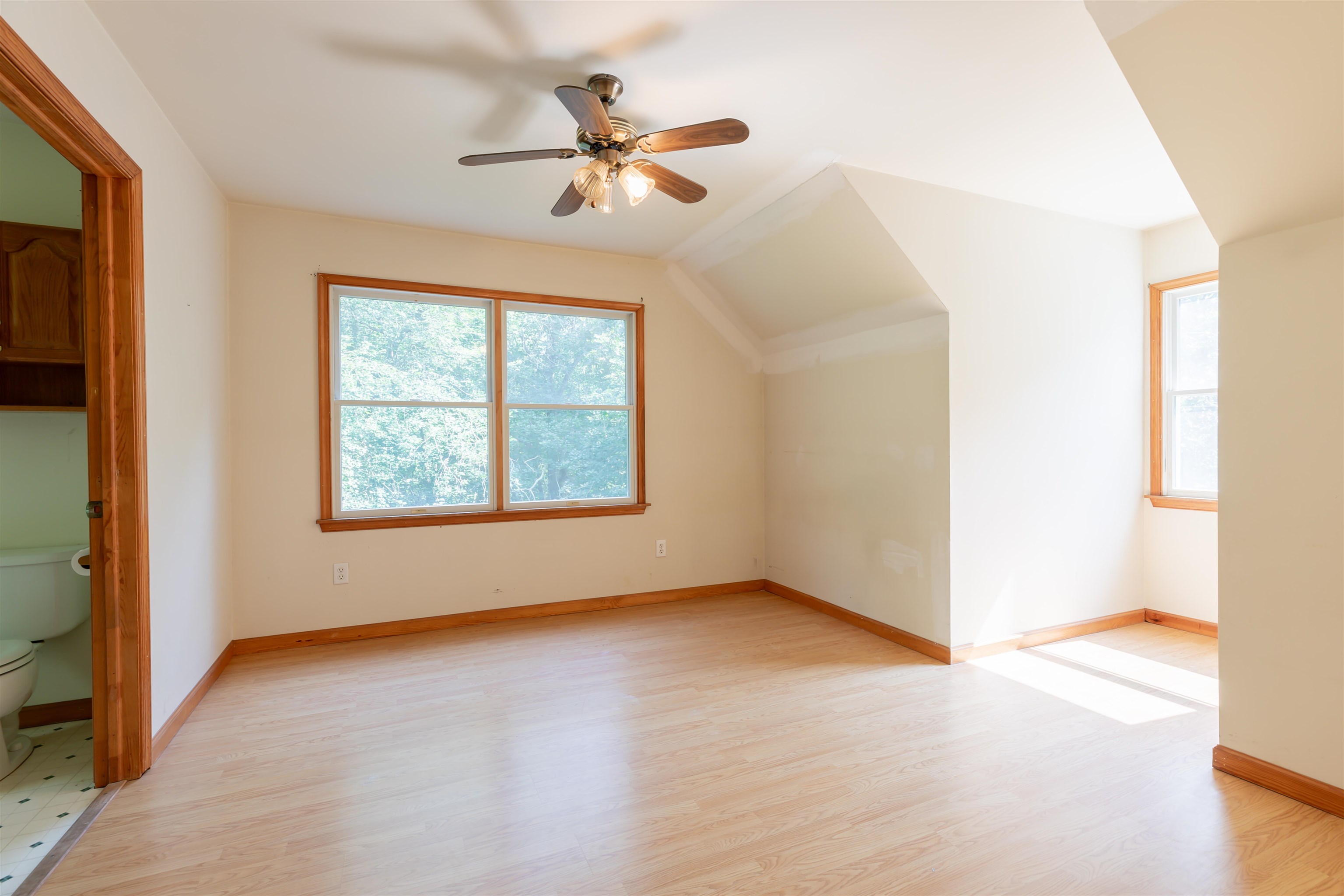 837 Weeks Landing Road Cape May, NJ 08204 - Photo 19 of 38 wooden floor in an empty room with a window
