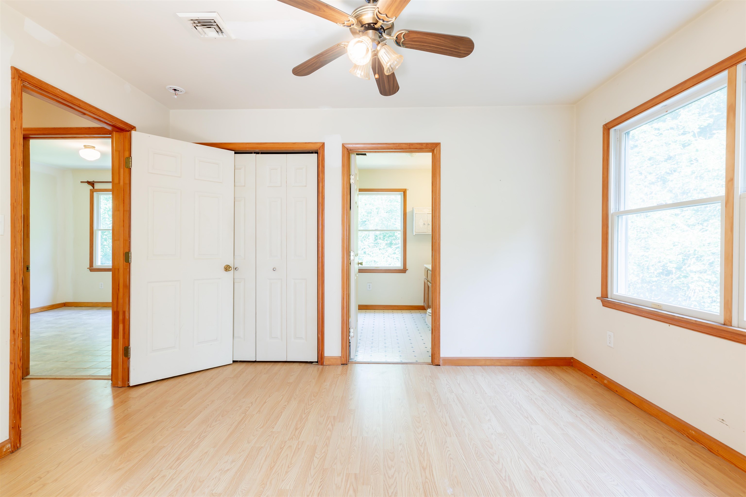 837 Weeks Landing Road Cape May, NJ 08204 - Photo 20 of 38 a view of an empty room with window and wooden floor