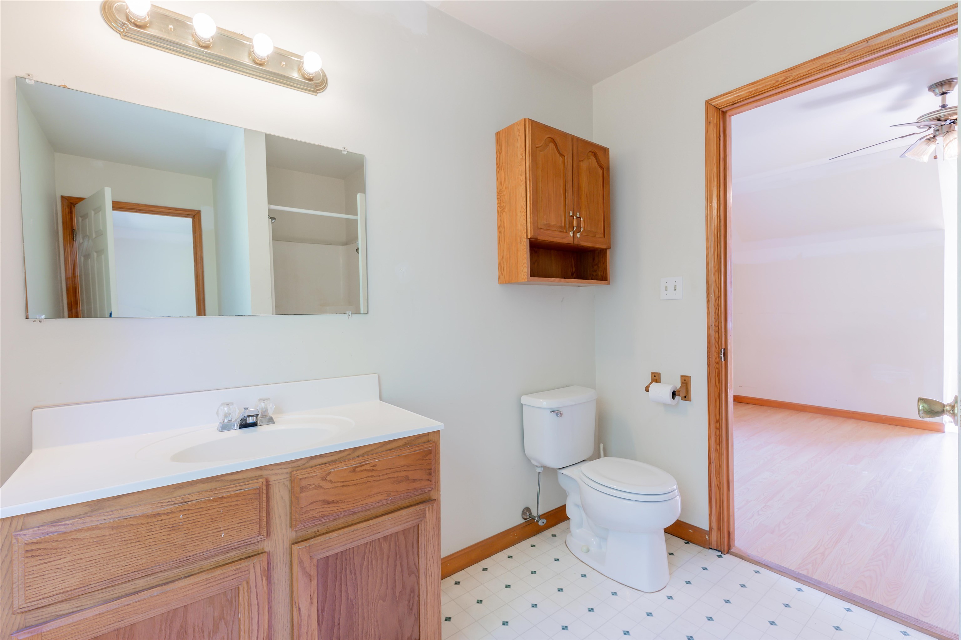 837 Weeks Landing Road Cape May, NJ 08204 - Photo 24 of 38 a bathroom with a sink a toilet and a mirror